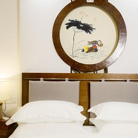 Fenghuang Poshan Inn Фенян Екстериор снимка