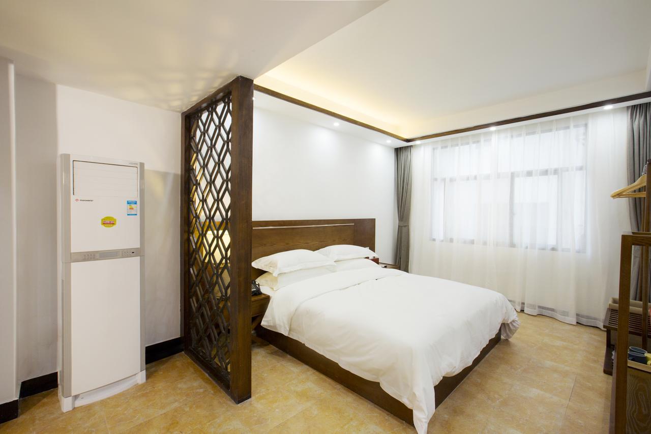 Fenghuang Poshan Inn Фенян Екстериор снимка