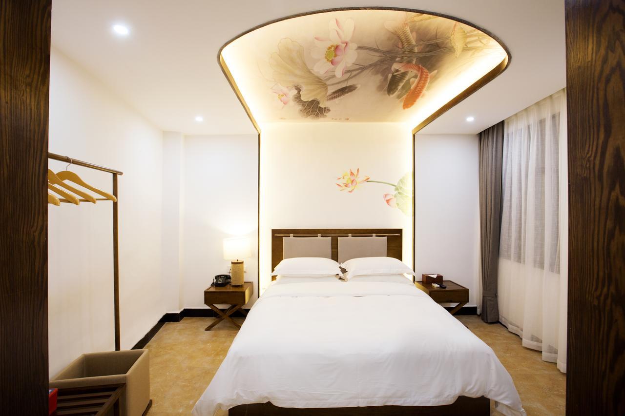 Fenghuang Poshan Inn Фенян Екстериор снимка